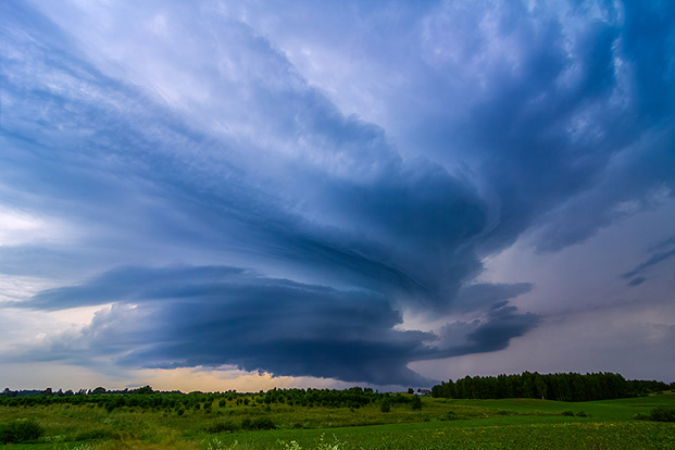 Storm clouds over field, storm cell, extreme weather, dangerous storm